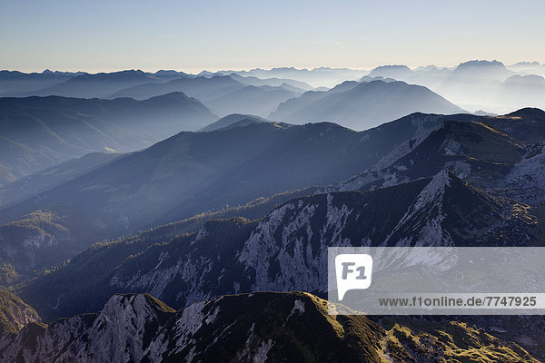 Mountain ridges with backlighting  seen from Hochiss Mountain in Rofan