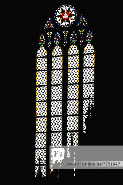 Darkness and bright window in a cathedral