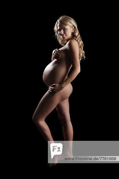 Nackte schwangere Frau