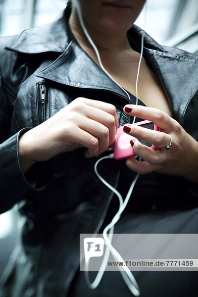 Woman listening to iPod