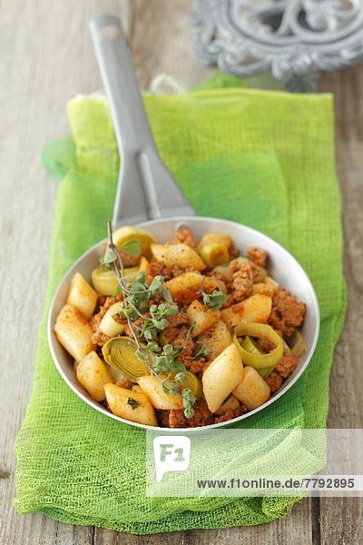 Gnocchi with pork  leek and tomato sauce