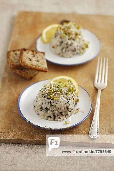 Cod tartar with black sesame and sprouts