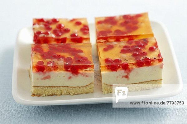 Sponge cake with cream  jelly and red currants