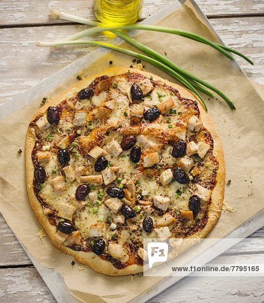 Whole Barbecue Chicken Pizza with Olives  From Above