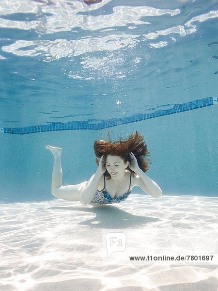 USA Utah Orem Portrait of young woman under water