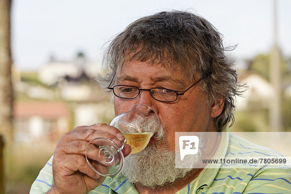 Man drinking an aperitif