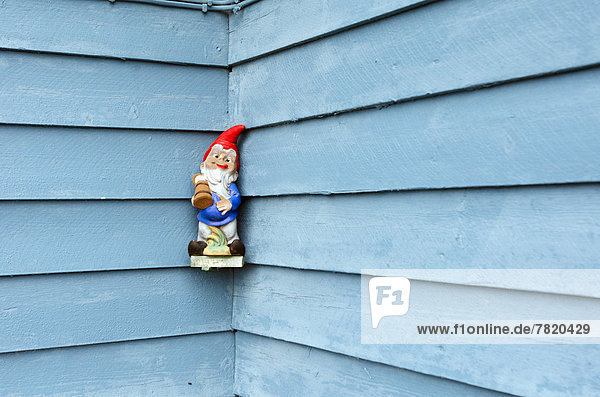 Garden gnome on the wall of the German research station in Ny Alesund