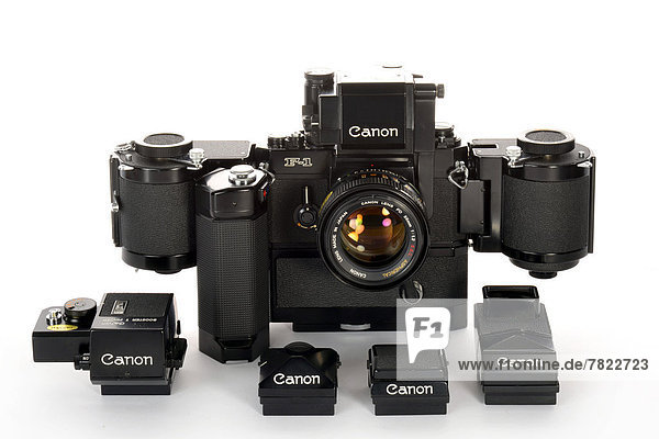 Canon F-1  model from 1971  with a 1.2-55mm aspherical SSC FD lens  T finder with amplifier  booster  waist level finder  prism finder  sports finder  rollfilm holder 250  Motor Drive MF  power seeker EE