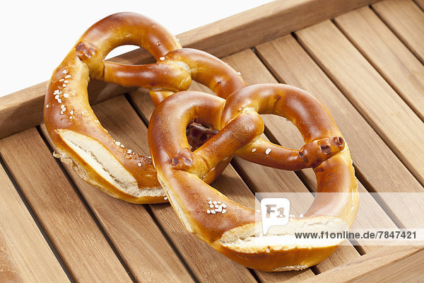 Pretzels on wooden tray  close up