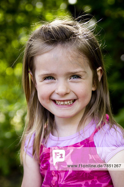 Portrait of girl smiling  close up