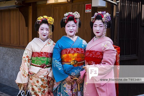 Traditionally dressed Geishas in the old quarter of Kyoto  Japan  Asia