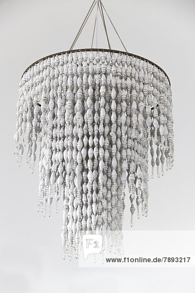 Close-up of a chandelier hanging from a ceiling
