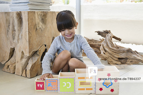 Girl playing with number blocks