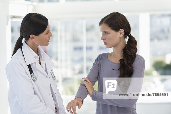 Patient discussing with a doctor