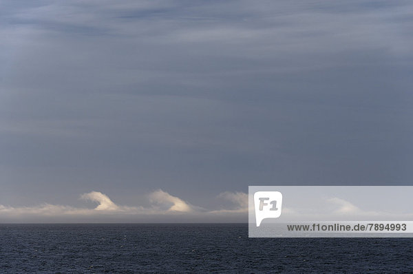 Kelvin-Helmholtz instability  clouds over the sea