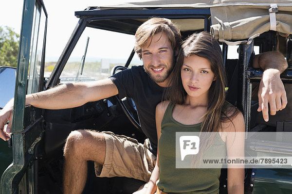 Portrait of a couple on SUV