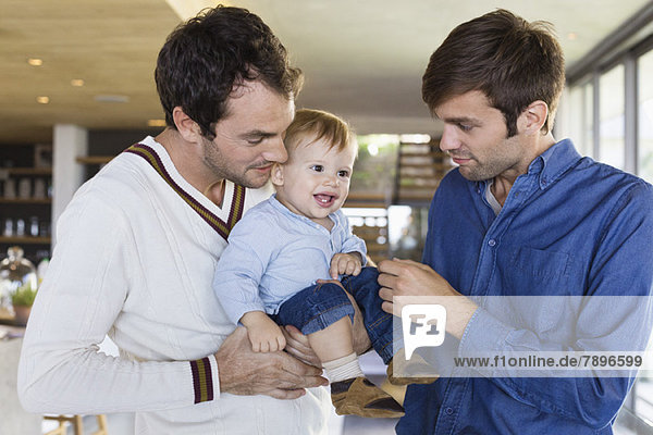 Parents with their son at home