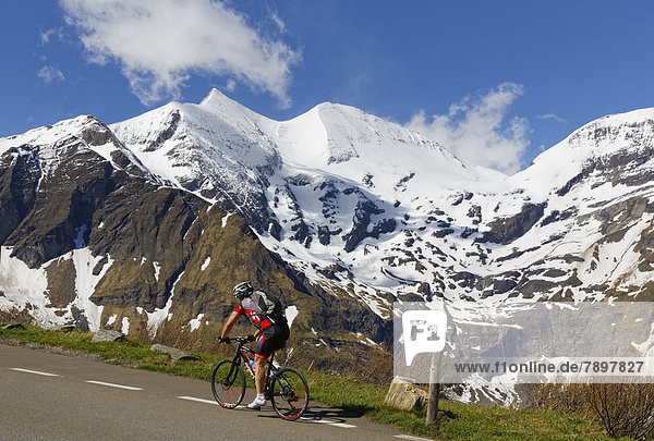 Glockner Group with Sonnenwelleck Mountain and Fuschlkarkopf Mountain  cyclists on Grossglockner High Alpine Road