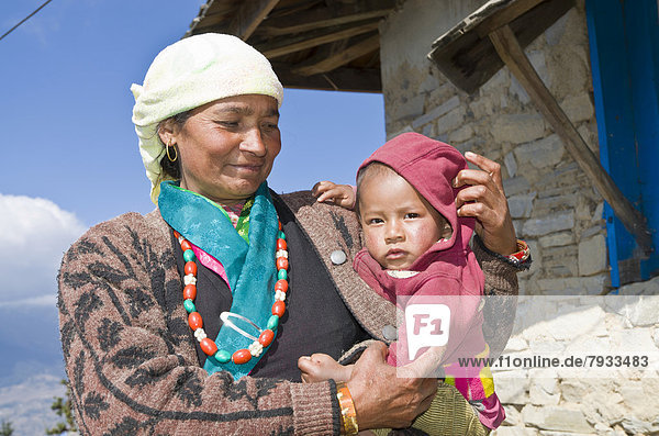 Nepali mother with her baby