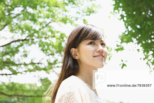 Young woman smiling away