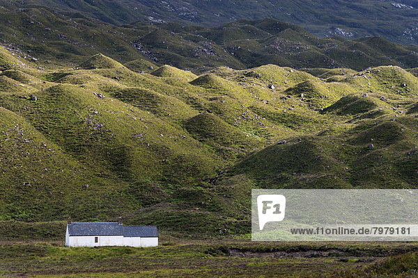 United Kingdom, Scotland, View of Cottage at Torridon hills