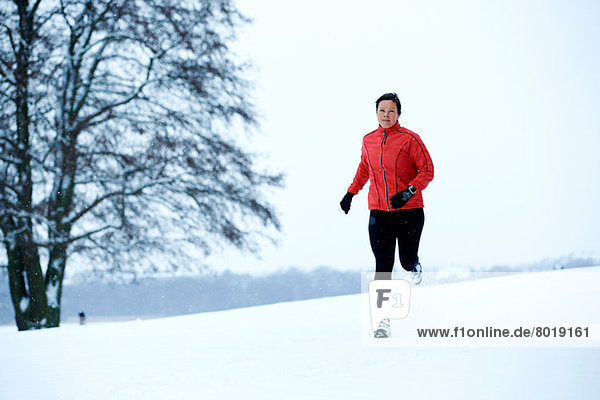 Woman snow running