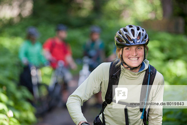 Female cyclist smiling