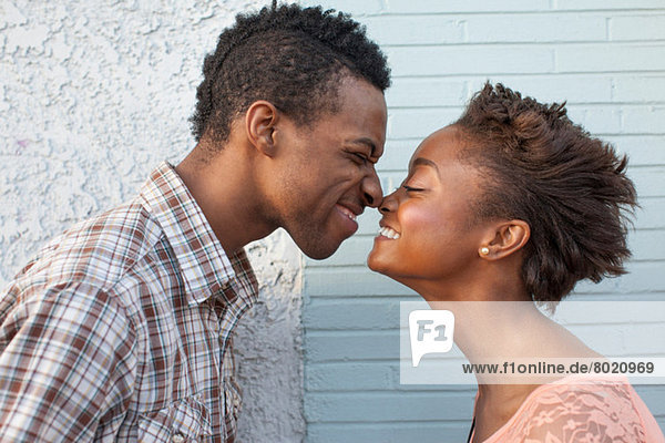 Young couple touching noses