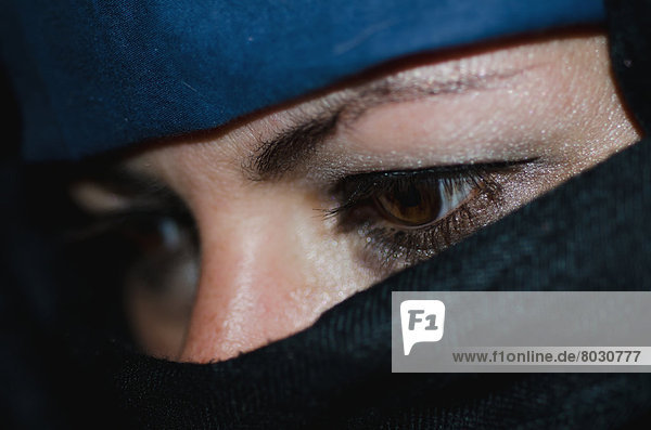 A woman wearing a hijab with only her eyes showing Locarno ticino switzerland