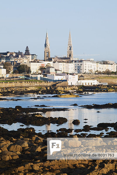 A view across the water to the buildings in the seaside town of dun laoghaire Dun laoghaire county dublin ireland