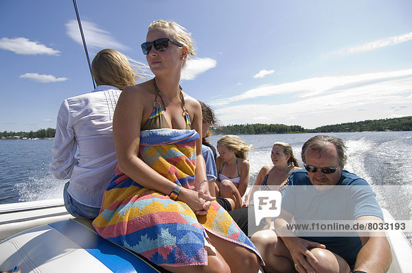 Cottagers In Swim Suits On A Motor Boat On Gunn Lake  Ontario  Canada.