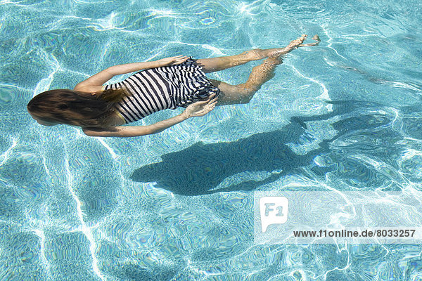 Girl Swimming Underwater  Ontario Canada