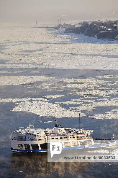 Ferry Moving Through Ice On The Saint Lawrence River  Quebec Canada