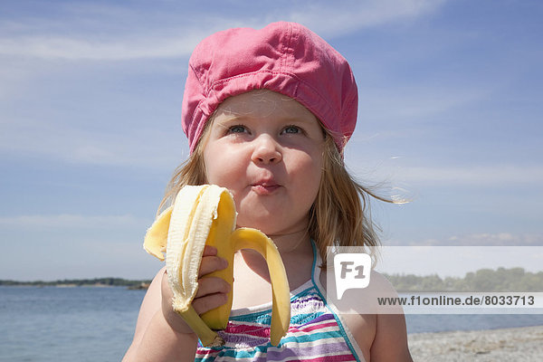 Fröhlichkeit  Strand  Banane  Hut  pink  jung  Mädchen