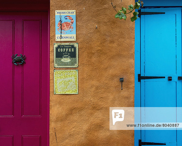 Colorful shop front doors and signs  Falmouth  Cornwall  England  United Kingdom