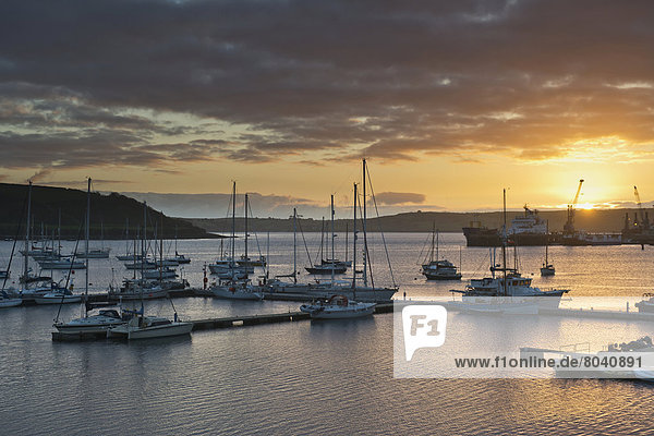 Sunrise in harbor Falmouth Cornwall England United Kingdom
