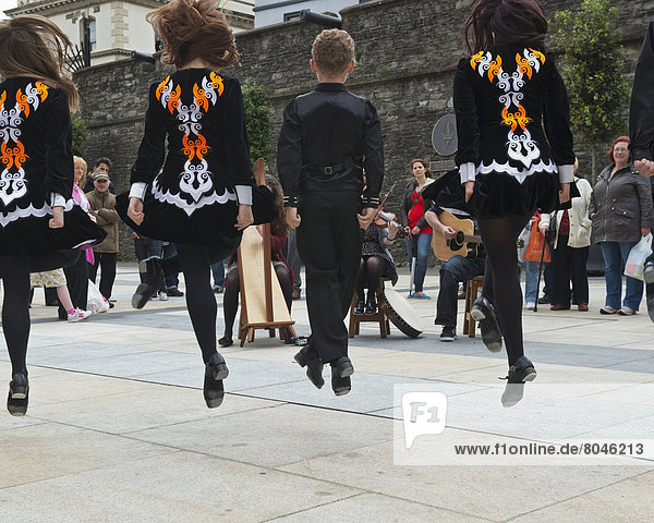 Irish dancers and musicians playing at Guildhall Square  Derry  County Londonderry  Northern Ireland  United Kingdom
