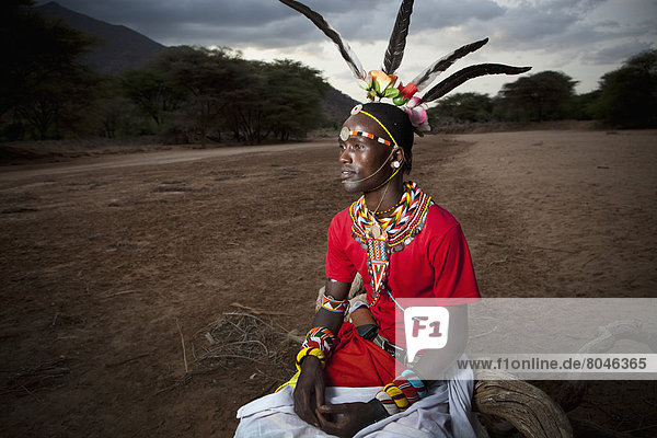 Portrait of young Samburu Moran (warrior) in traditional dress  South Horr  Kenya