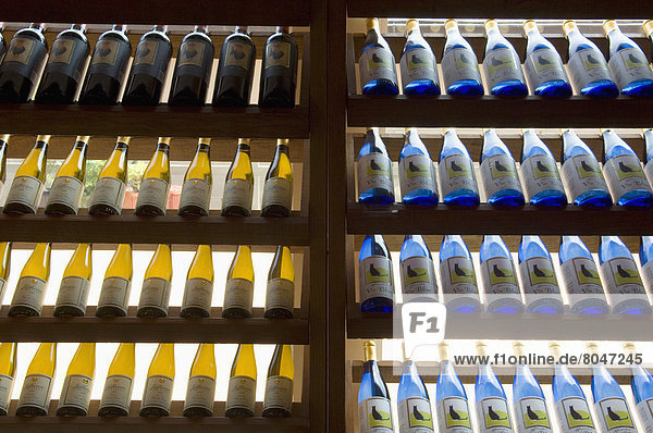 Rows of colorful wine bottles at Jefferson Vineyards  Charlottesville  Virginia  USA