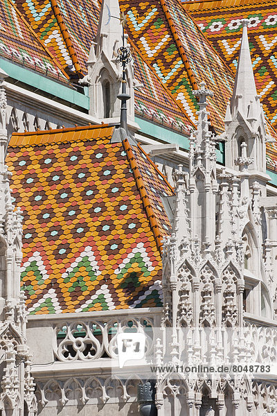 Multi colored roof of Matthias Church  Budapest  Hungary