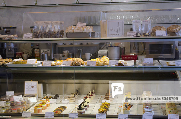 Counter with brioches  croissants and cakes at Weinwurm cafe  Vienna  Austria