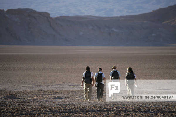 People hiking in Valle de la Luna  San Pedro de Atacama  Chile