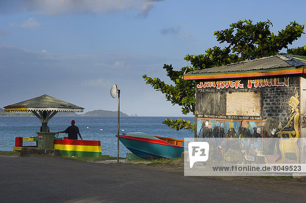 Colorful painted stall Hillsborough Carriacou Island Grenadines Grenada Caribbean