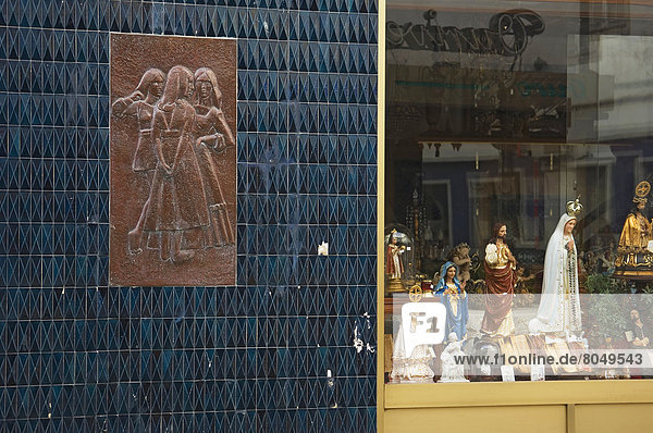 View of shop with religious items and tile relief Ponta Delgada Sao Miguel Island Azores Portugal
