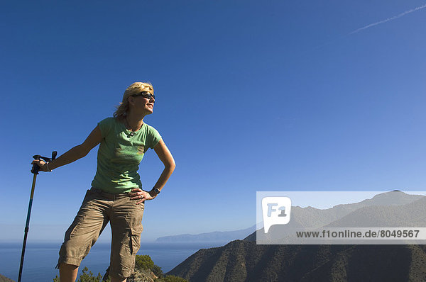 Young woman hiking on Vallehermoso trail La Gomera Canary Islands Spain