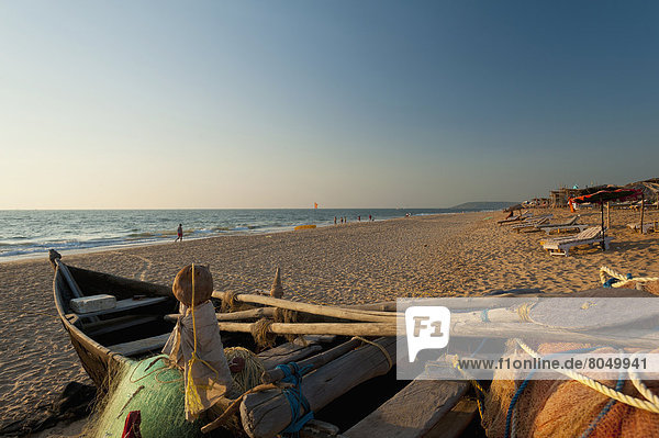 Fishing boat on beach Candolim Goa India