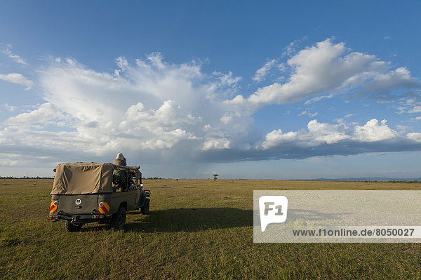 Tourist looking at view in Ol Pejeta Conservancy  Laikipia Country  Kenya