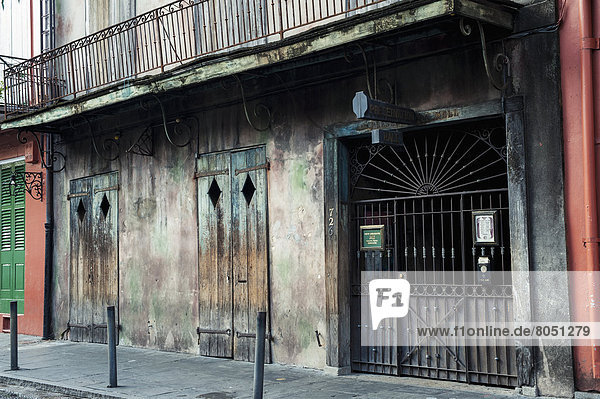 Front side of worn out building  New Orleans  Louisiana  USA