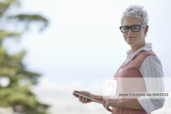 Businesswoman holding tablet computer