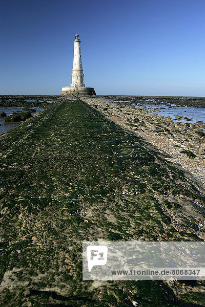 The lighthouse of Cordouan  built on a rocky small island  part of the town of Verdon-sur-mer  in the Gironde department. It's located 7 km off the coast and is the oldest lived-in lighthouse still in activity. It's listed ancient monument. Here  the lighthouse viewed from the dyke used to resupply the lighthouse.